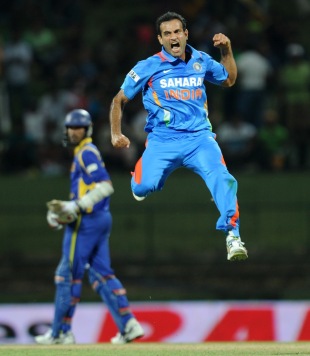 Indian cricketer Irfan Pathan (C) celebr